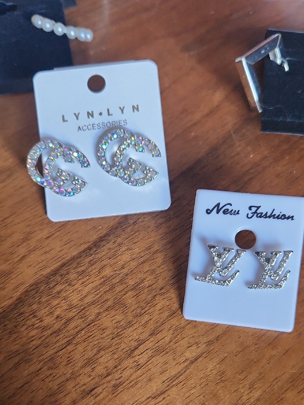 LYN•LYN Crystal Logo Stud Earrings in Iridescent Clear
